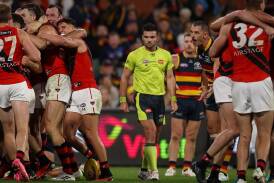 The AFL has defended the standard of umpiring this season, despite widespread confusion. (Matt Turner/AAP PHOTOS)